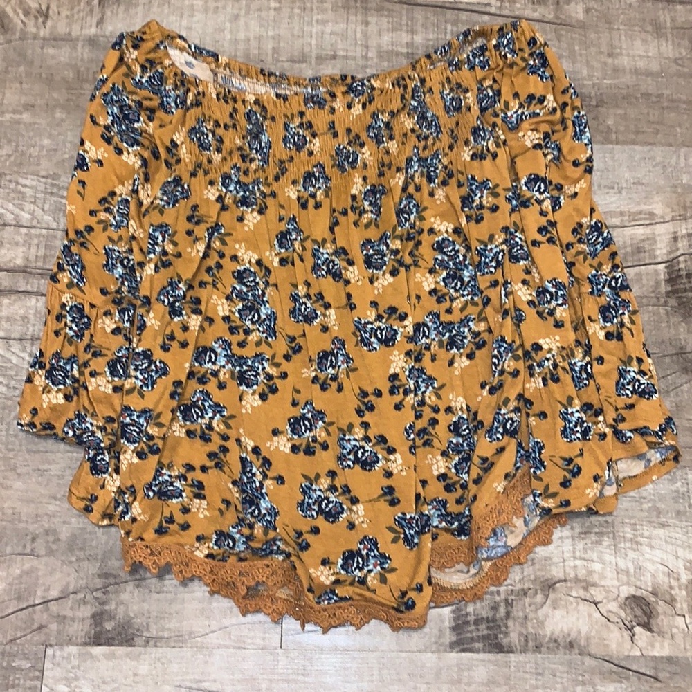Tan orange color with flower design